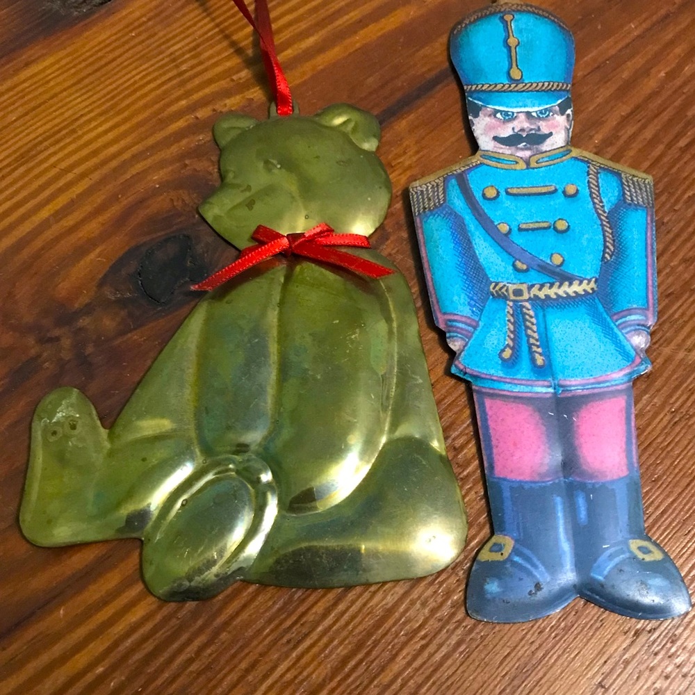 Two vintage Dept 56 metal ornaments Christmas nutcracker